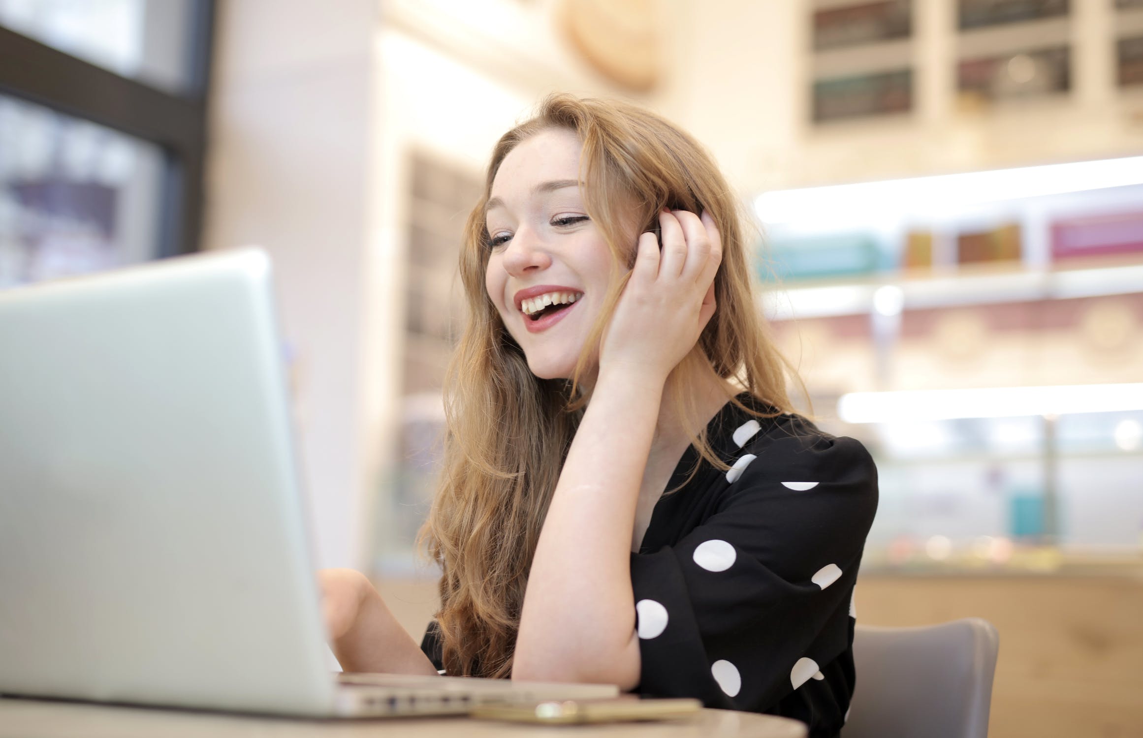 Woman Using Laptop to view accessible website